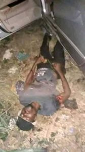 shot dead beside his car