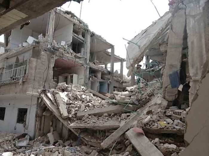 The collapsed building yesterday