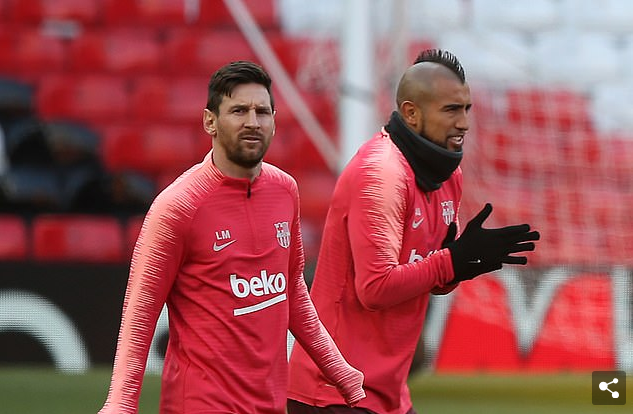 Messi and teammate, Vidal