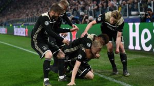 Ajax players celebrating their win over juventus champions league