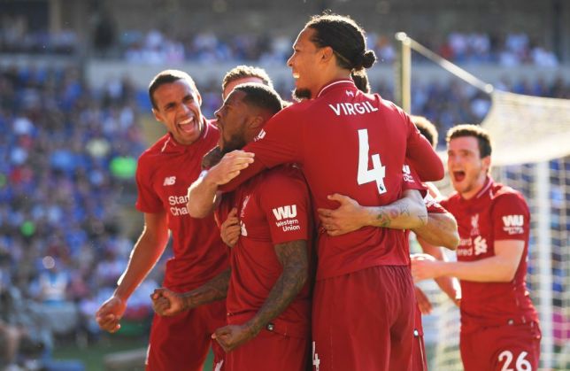 Liverpool players celebrate win over Huddersfield