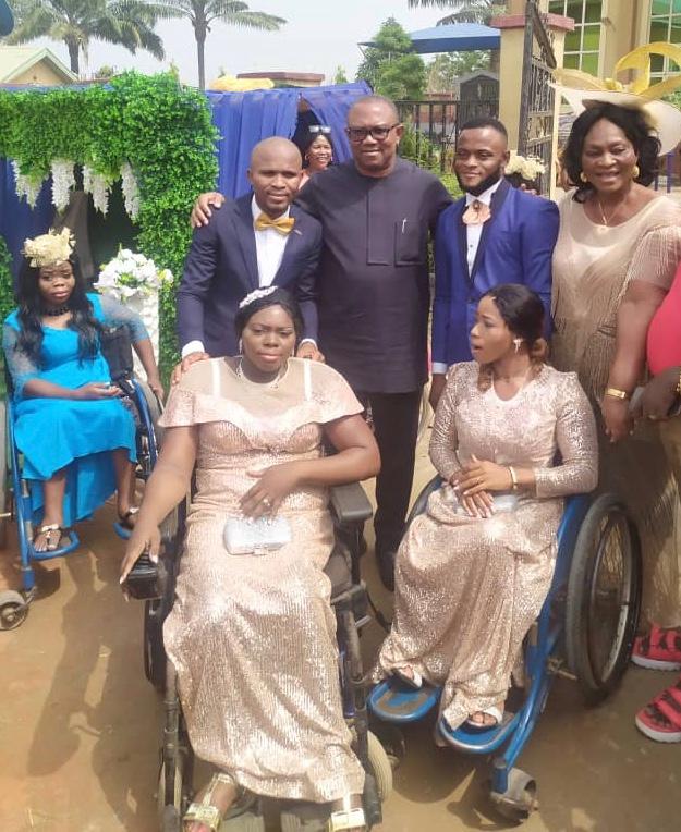 PHOTO: Back row: from Right, Mrs. Rosemary Odunukwe, Proprietor of Recdot Centre for the Physically Challenged; the newly wedded, Samson Fidelis and wife, Gloria (seated on the right); Mr. Peter Obi, the Father of the Day, and another newly wedded, Ikenna Ibeadua and wife, Judith (seated on the left), after their wedding at St. Aloysius Church of Divine Mercy, Recdot Centre, Ozubulu, on Monday.