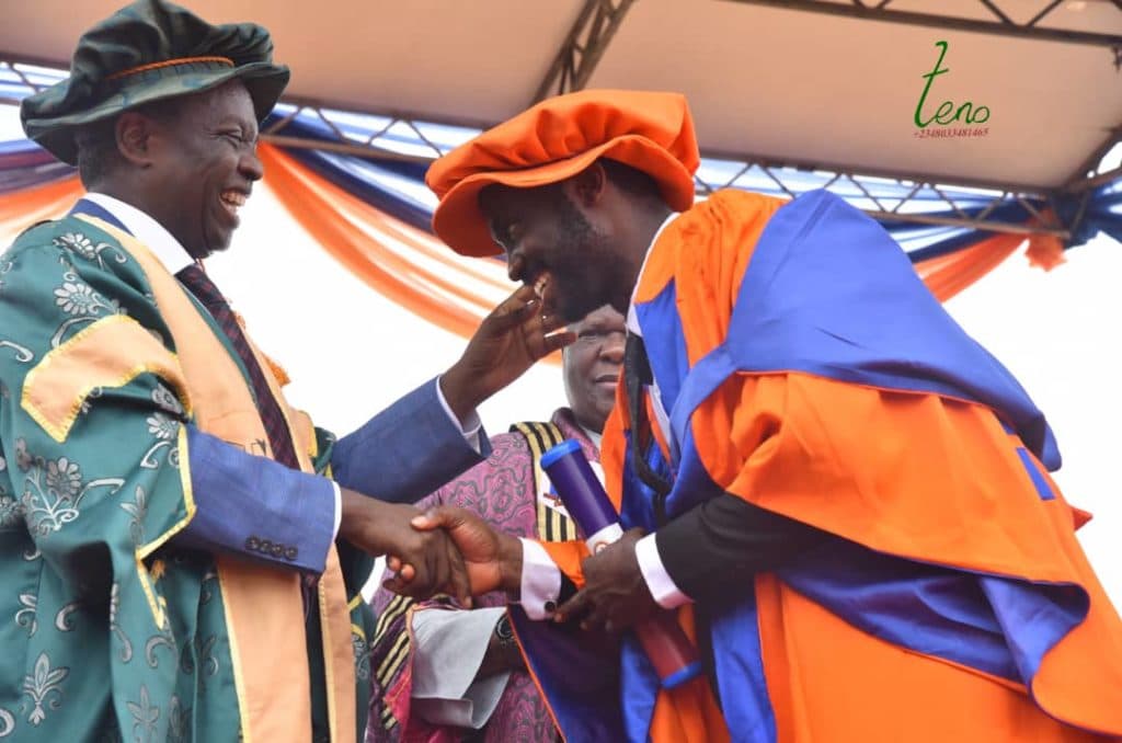 Vice Chancellor Nnamdi Azikiwe University Awka, Unizik, Prof Charles Okechukwu Esimone , FAS, in a warm handshake with Dr Odogwu Emeka Odogwu during the 14th convocation ceremonies of Unizik 