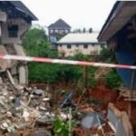 Heavy Rainfall Causes Building Collapse, Power Pole Damage in Awka